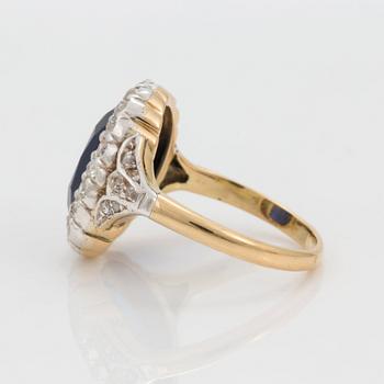 A 7.60 ct unheated sapphire and diamond cluster ring. Certoificate from SSEF.