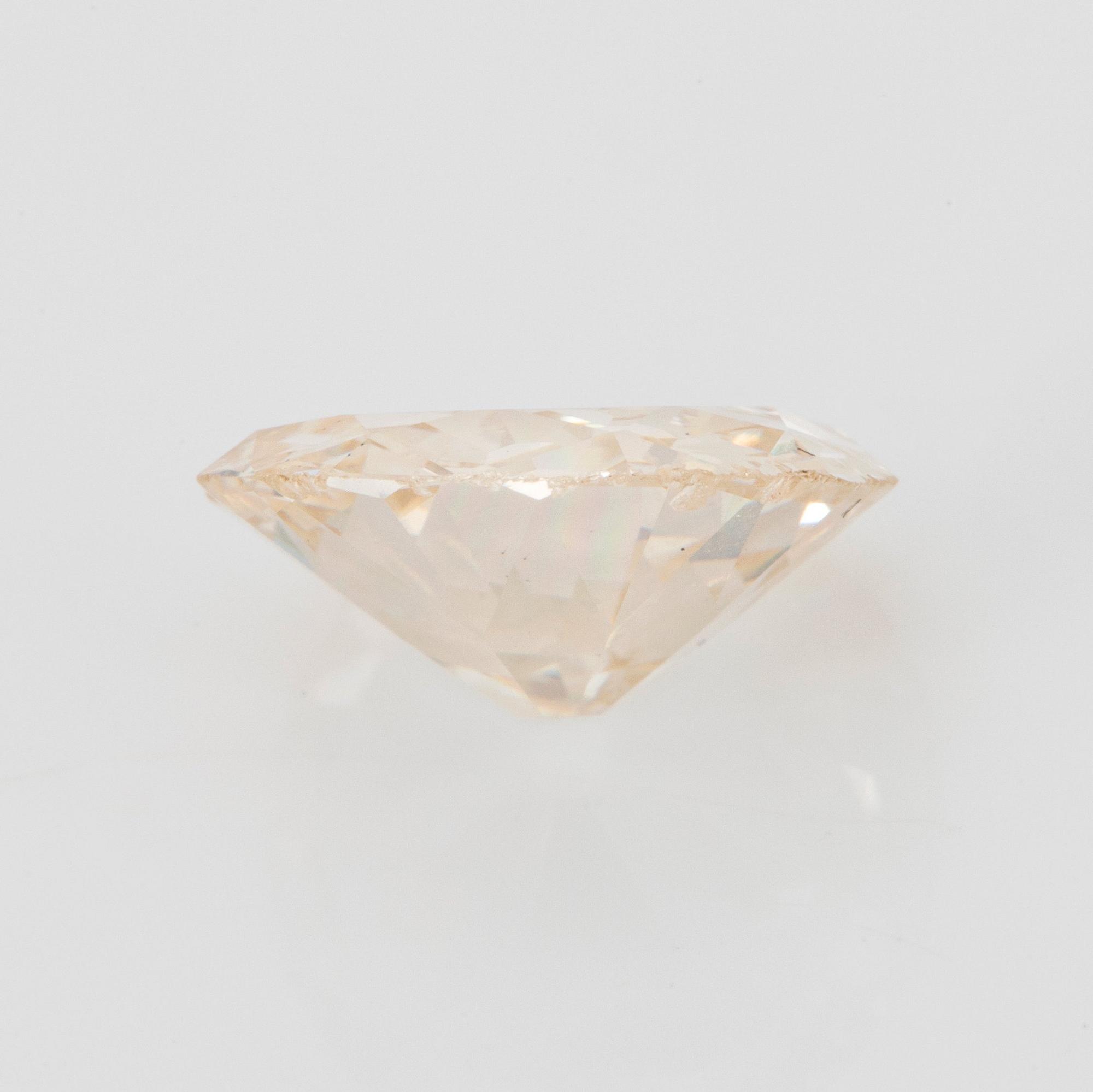En lös gammalslipad diamant 2.35 ct kvalitet ca L/M i.