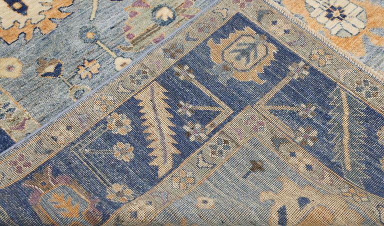 A carpet, Ziegler design, approx. 302 x 250 cm.
