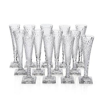 316. A set of 13 cut champagne flutes, 19th Century.