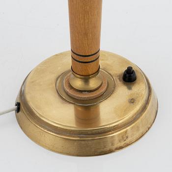 A Swedish Morden brass and elmwood table light, 1940's.