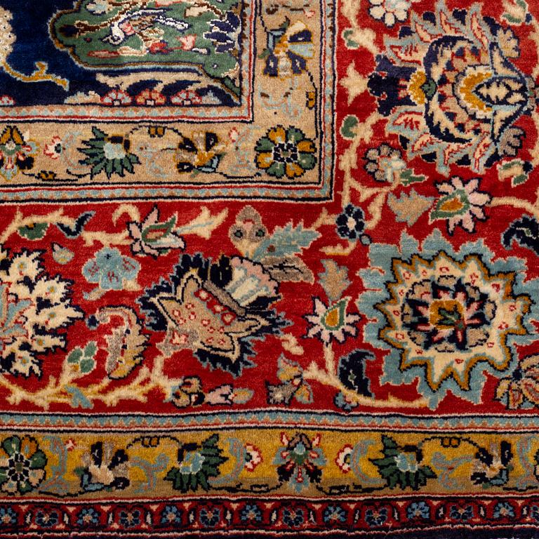 A CARPET so called Royal Kashan, part silk, signed, ca 483 x 311 cm.
