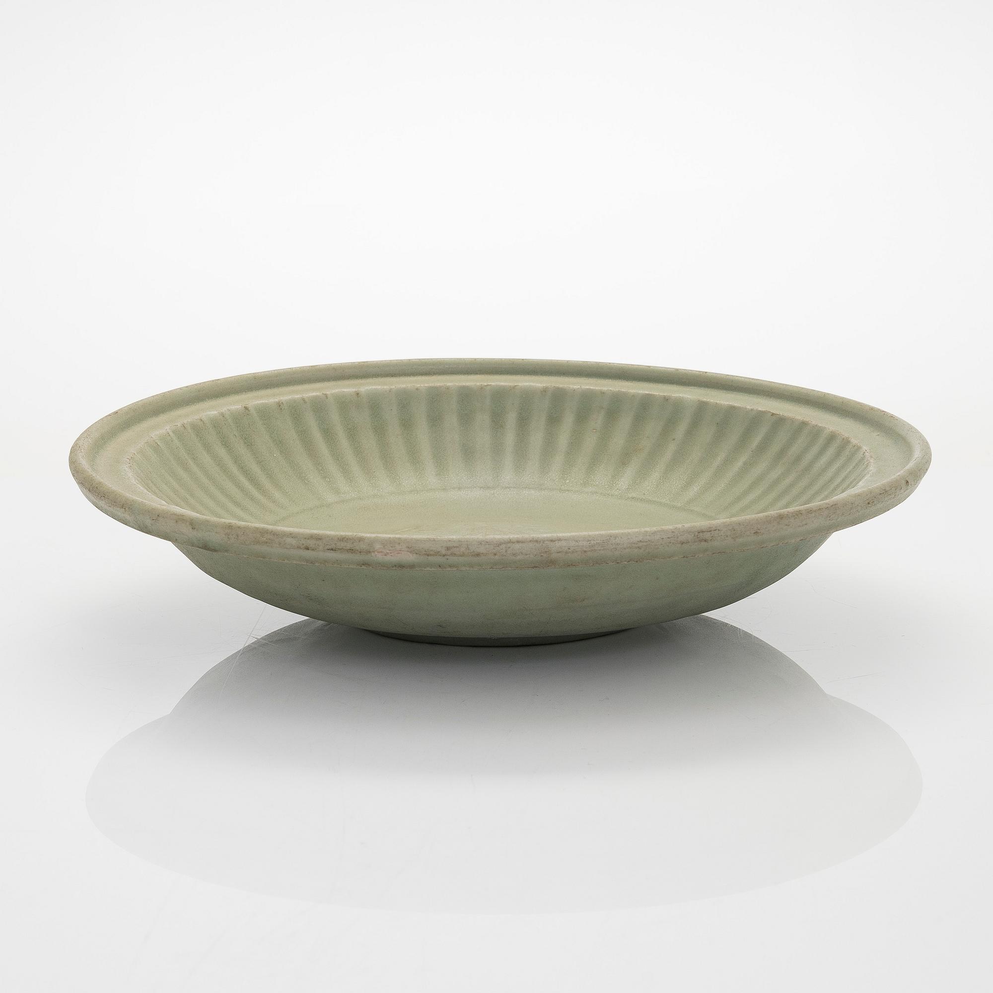 A Celadon dish, Ming dynasty (1368-1644).