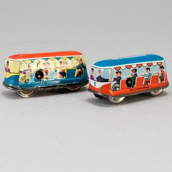 A 1960's  German toy car track with two mechanic buses.