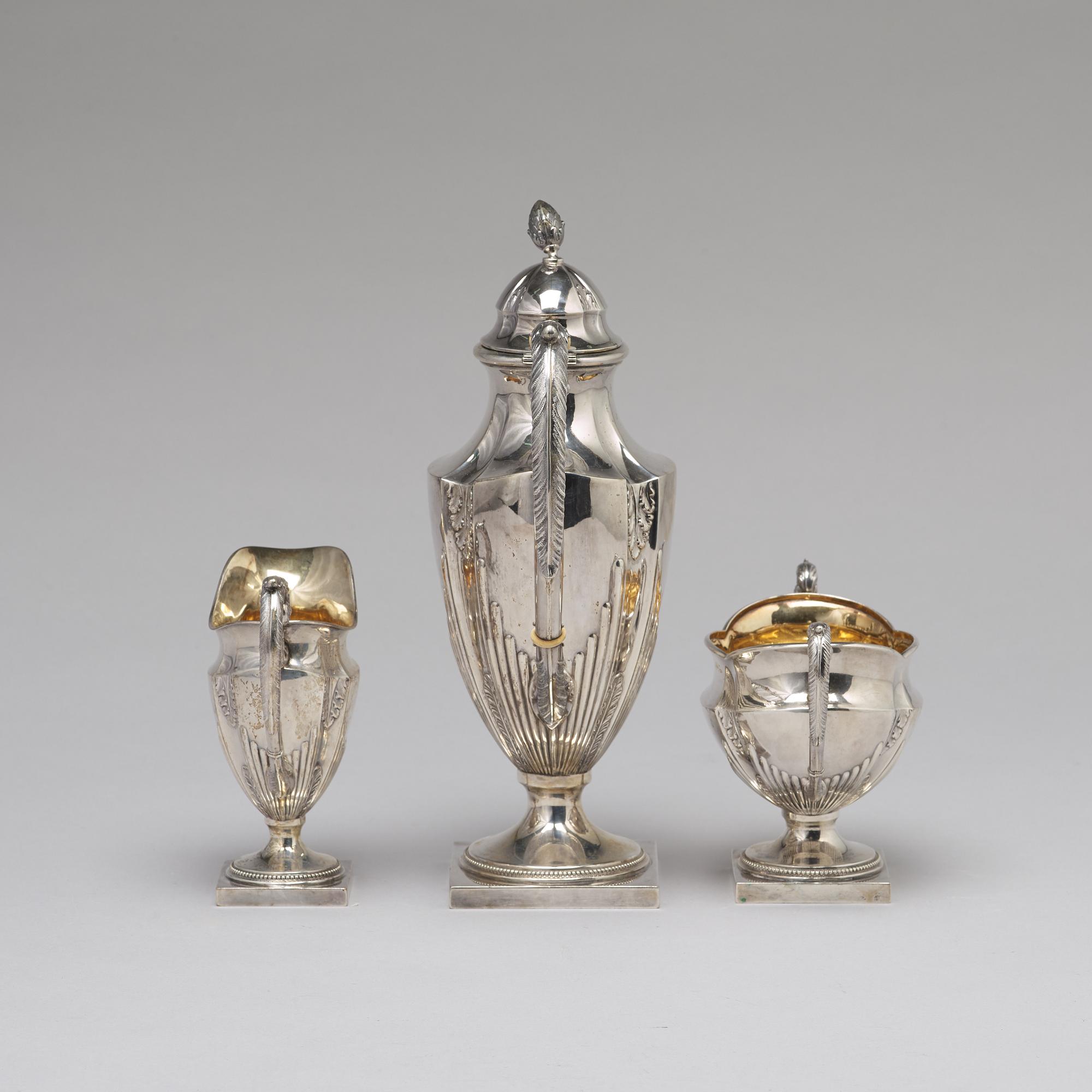 CG HALLBERG, a three part coffee silver service, Stockholm, 1904. 1152 gram.