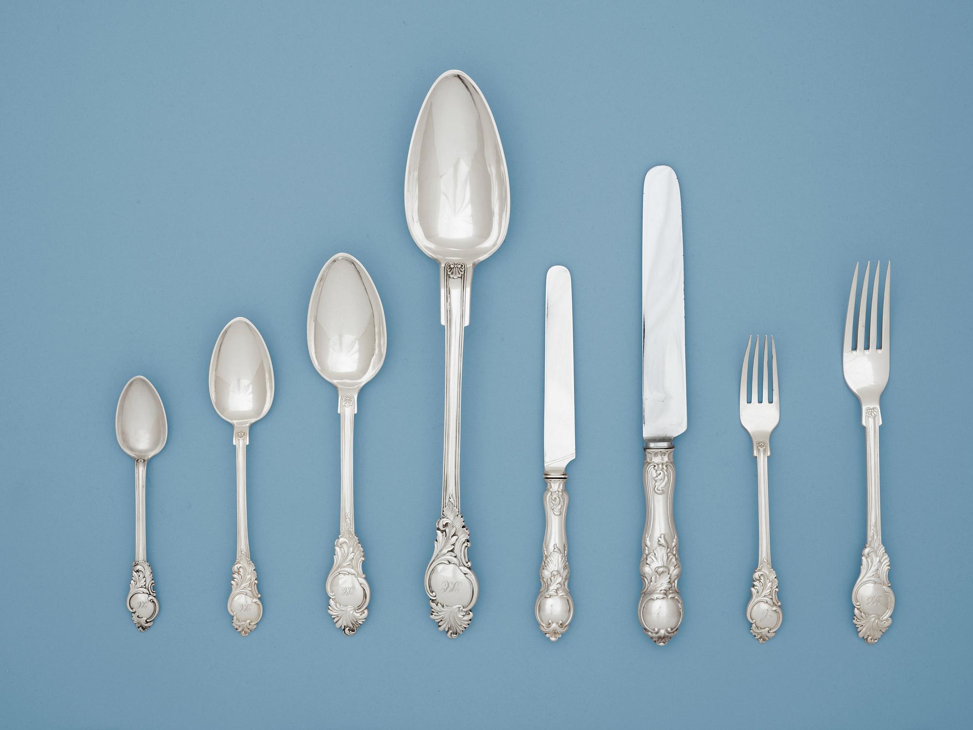 A Swedish 19th century 127 piece silver table-service, makers mark of Gustaf Möllenborg, Stockholm 1843-1861.