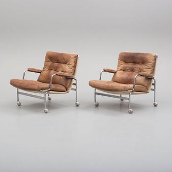 A PAIR OF BRUNO MATHSON ARMCHAIRS "KARIN" FOR DUX.