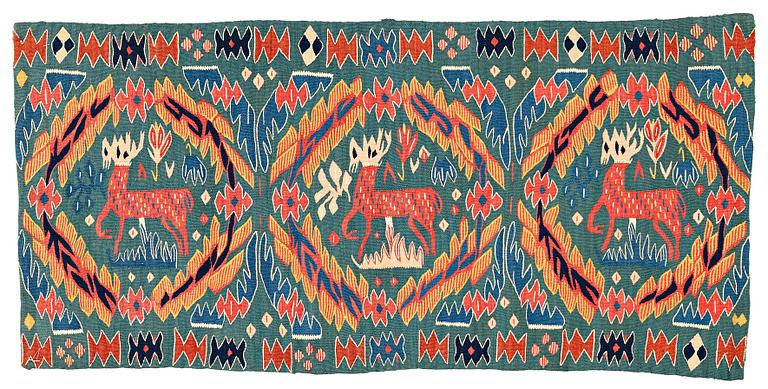 A CARRIAGE CUSHION, tapestry weave, "Kungahjorten", ca 50 x 104,5 cm, Scania (Sweden),