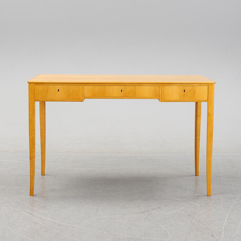 A 'Nya guldheden' desk by Carl Malmsten.