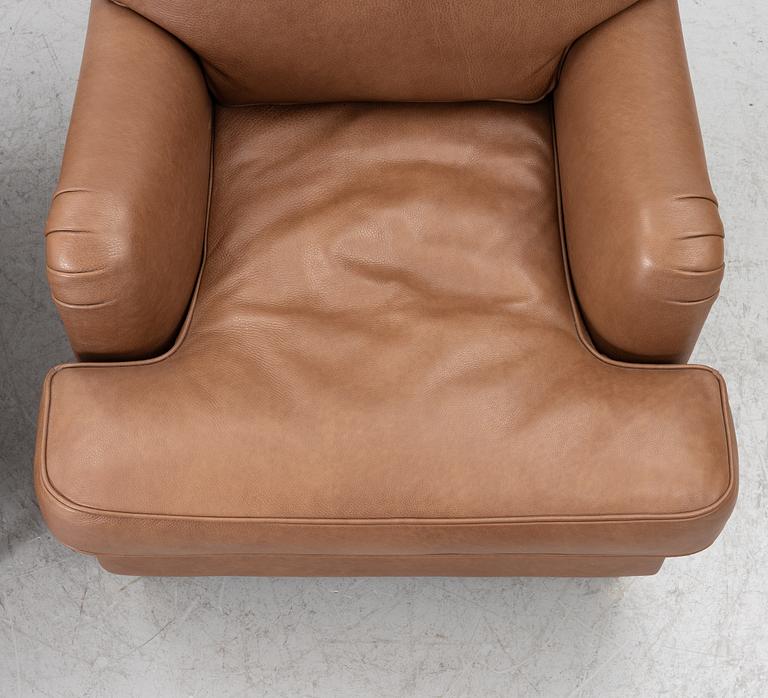 Armchairs, a pair, Howard model, IPD, Italy.