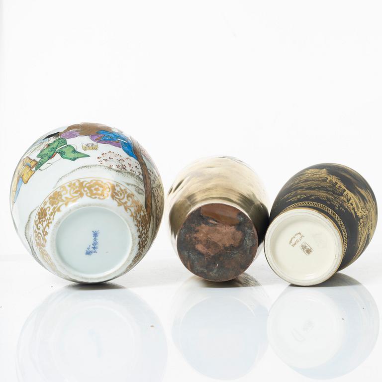 Two Japanese vases and a jar, porcelain and gilt copper, 20th century.