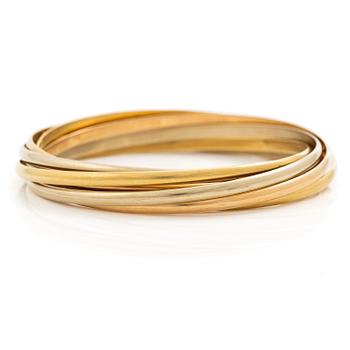 585. A Cartier bangle "Trinity" 18K gold in three colours.