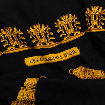Hermès, a 'Les Cavaliers d'Or' cashmere and silk shawl.