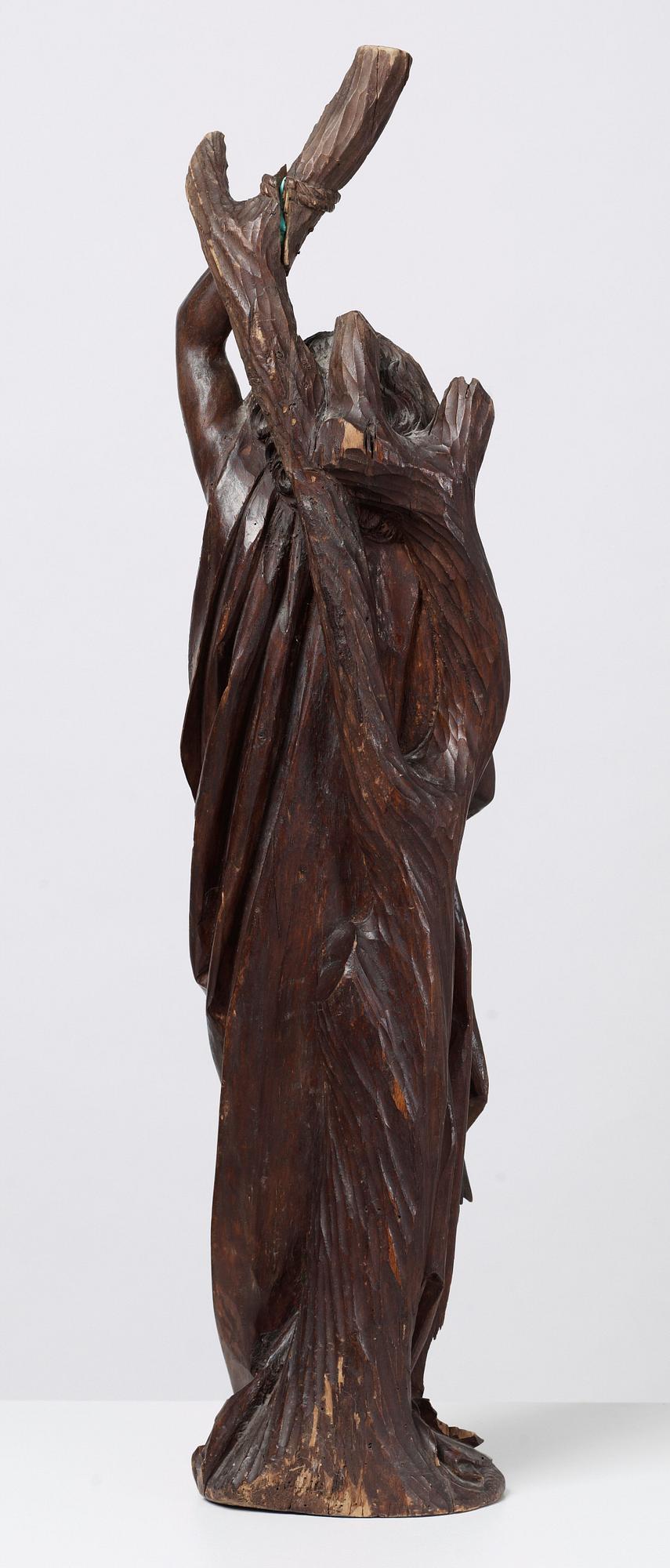 A wooden sculpture depicting St Sebastian, probably German, circa 1500.