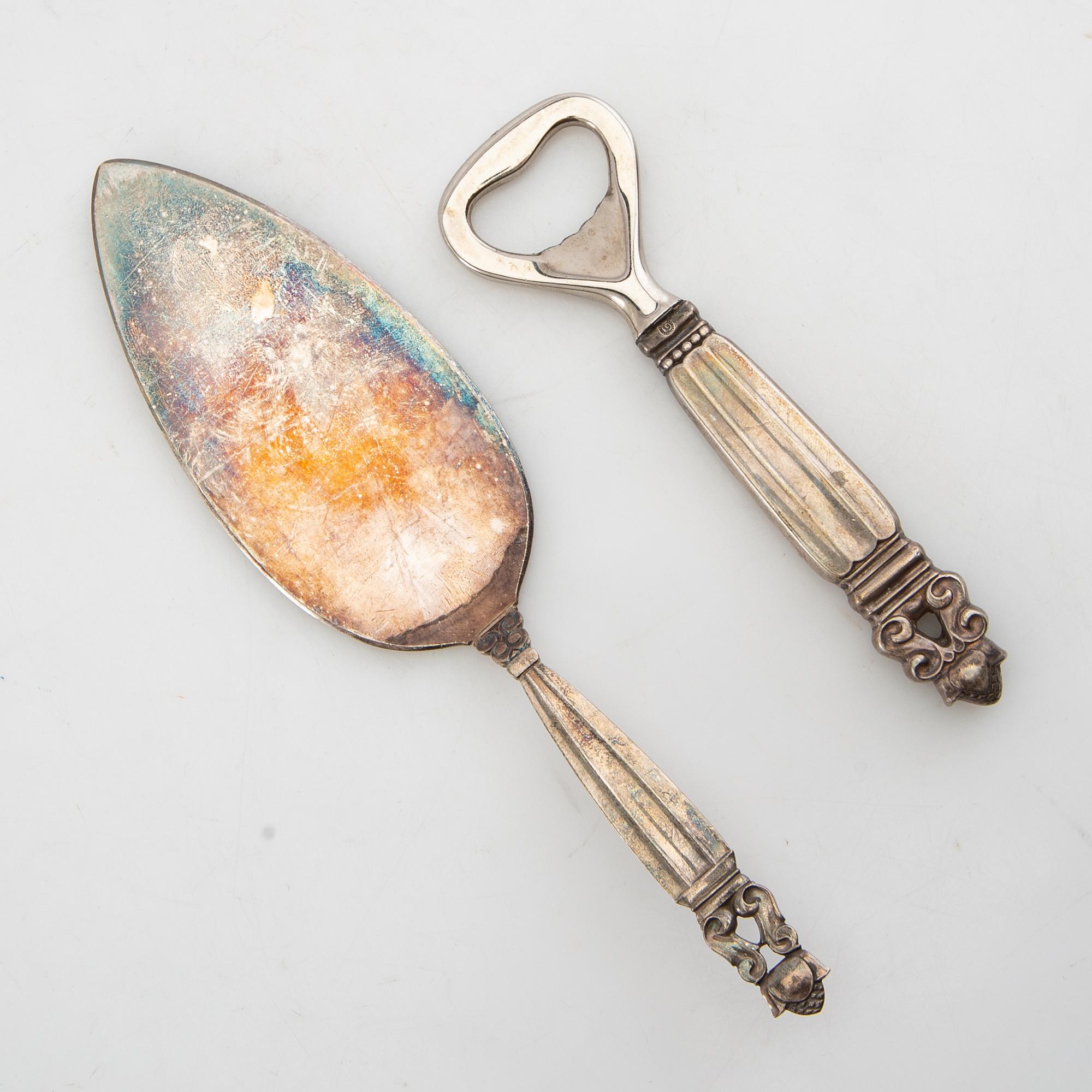 Johan Rohde, flasköppnare och tårtspade "Konge/Achorn" sterlingsilver för Georg Jensen efter 1945.