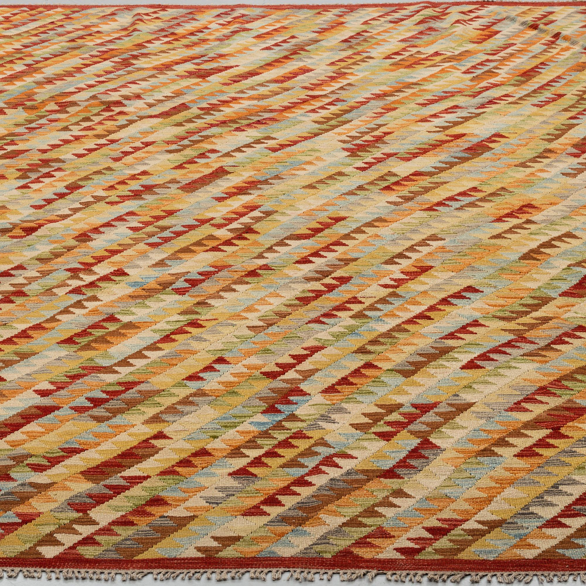 a carpet, Kilim, ca 332 x 253 cm.