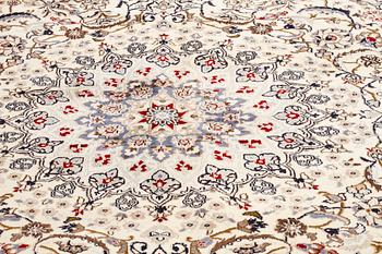 A CARPET, Nain, part silk, around 340 x 241 cm.