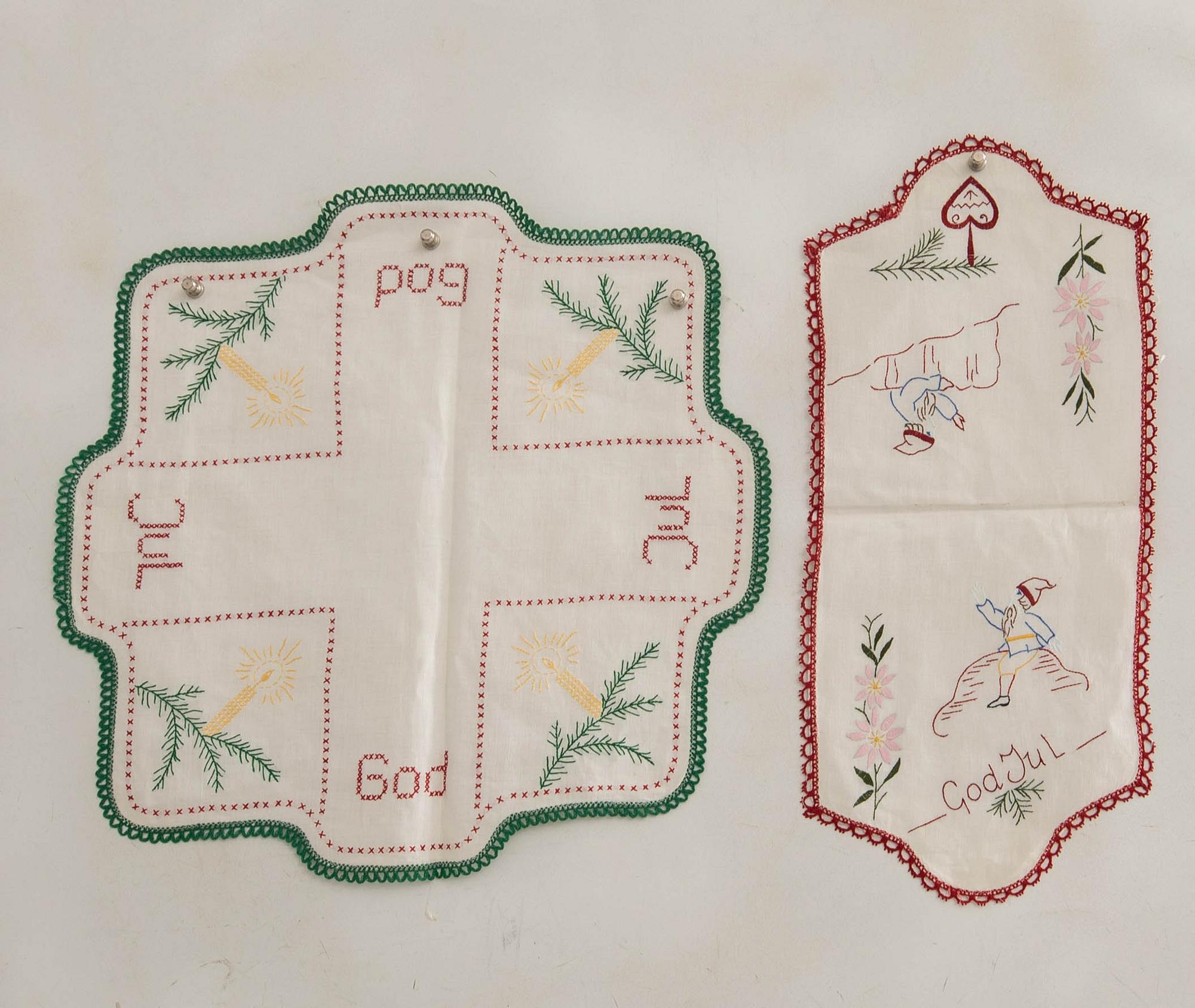 A collection of smaller Christmas tablecloths, runners, and wall hangings, approximately 34 pieces, mid/second half of the 20th century.