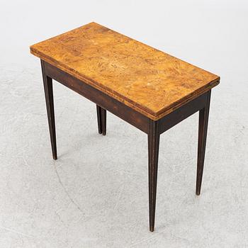A 19th century card table.