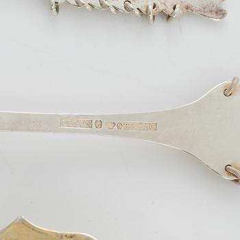 25 parcel-gilt silver cutlery,  1970-78.