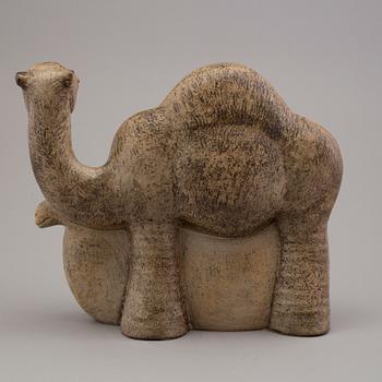 LISA LARSON, a stoneware figurine.