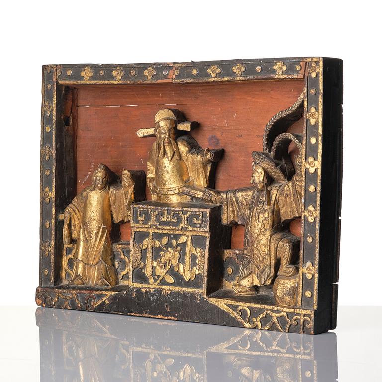 A Chinese wooden panel, Qing dynasty, 19th century.