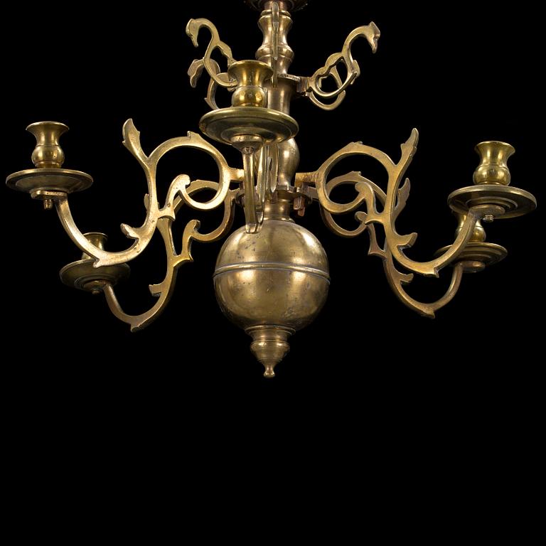 A baroque brass chandelier, first half of 18th century. Height (ink chain) 70 cm.