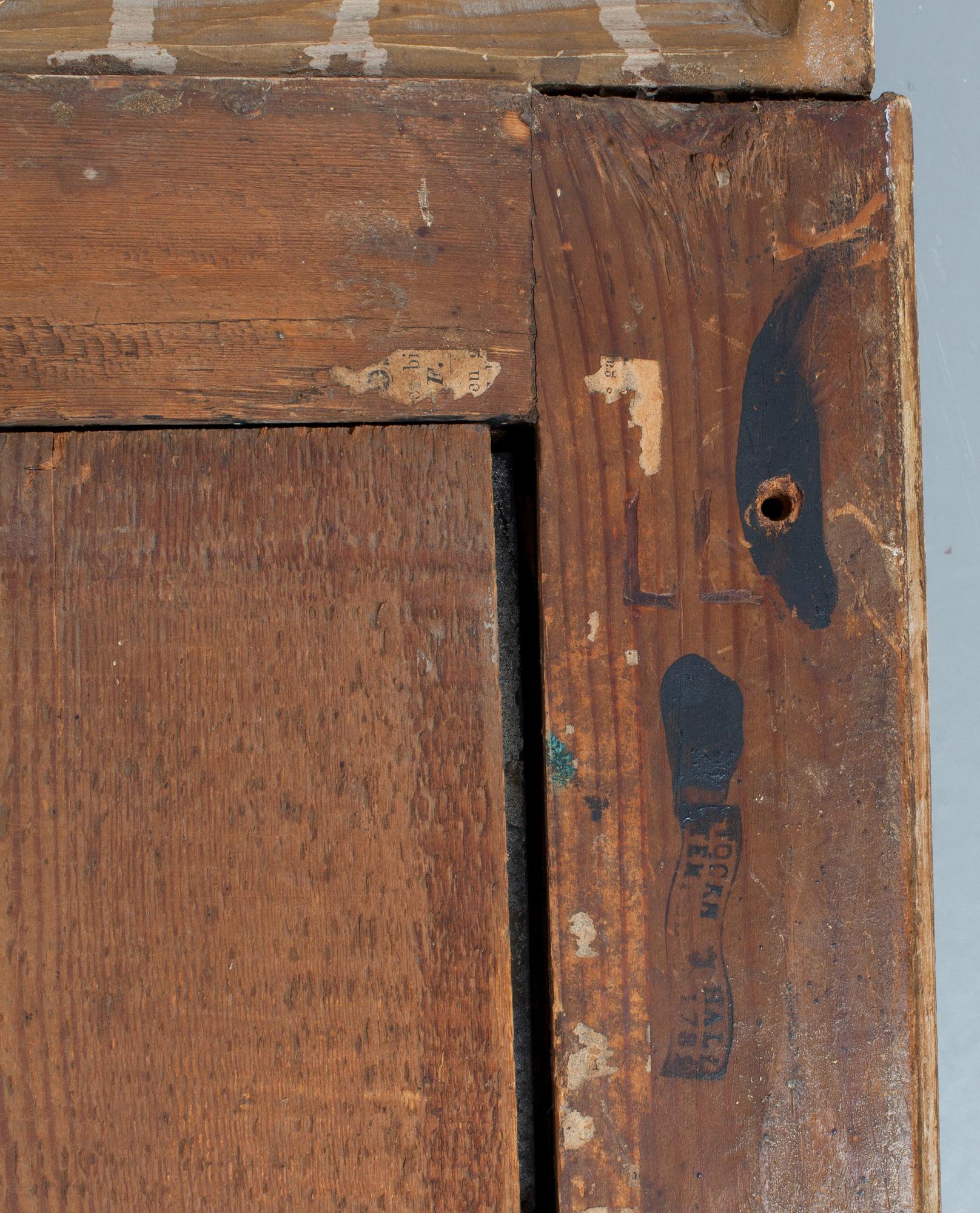 A pair of Gustavian two-light girandole mirrors by Lago Lundén, signed and dated 1789.