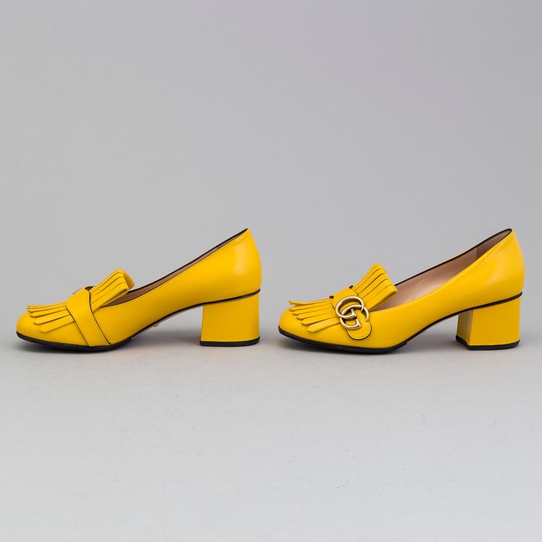 A pair of Loafers by Gucci, in size 39.