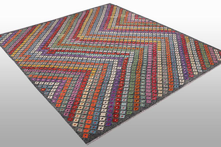 A carpet, kilim, ca 289 x 255 cm.