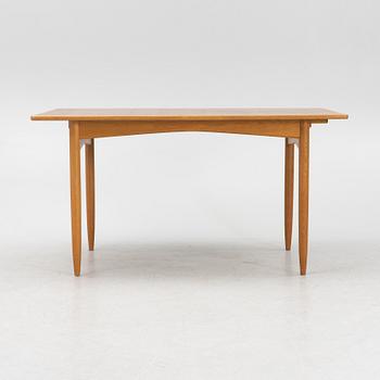 A teak and oak dining table, Scandinavia, 1960's.