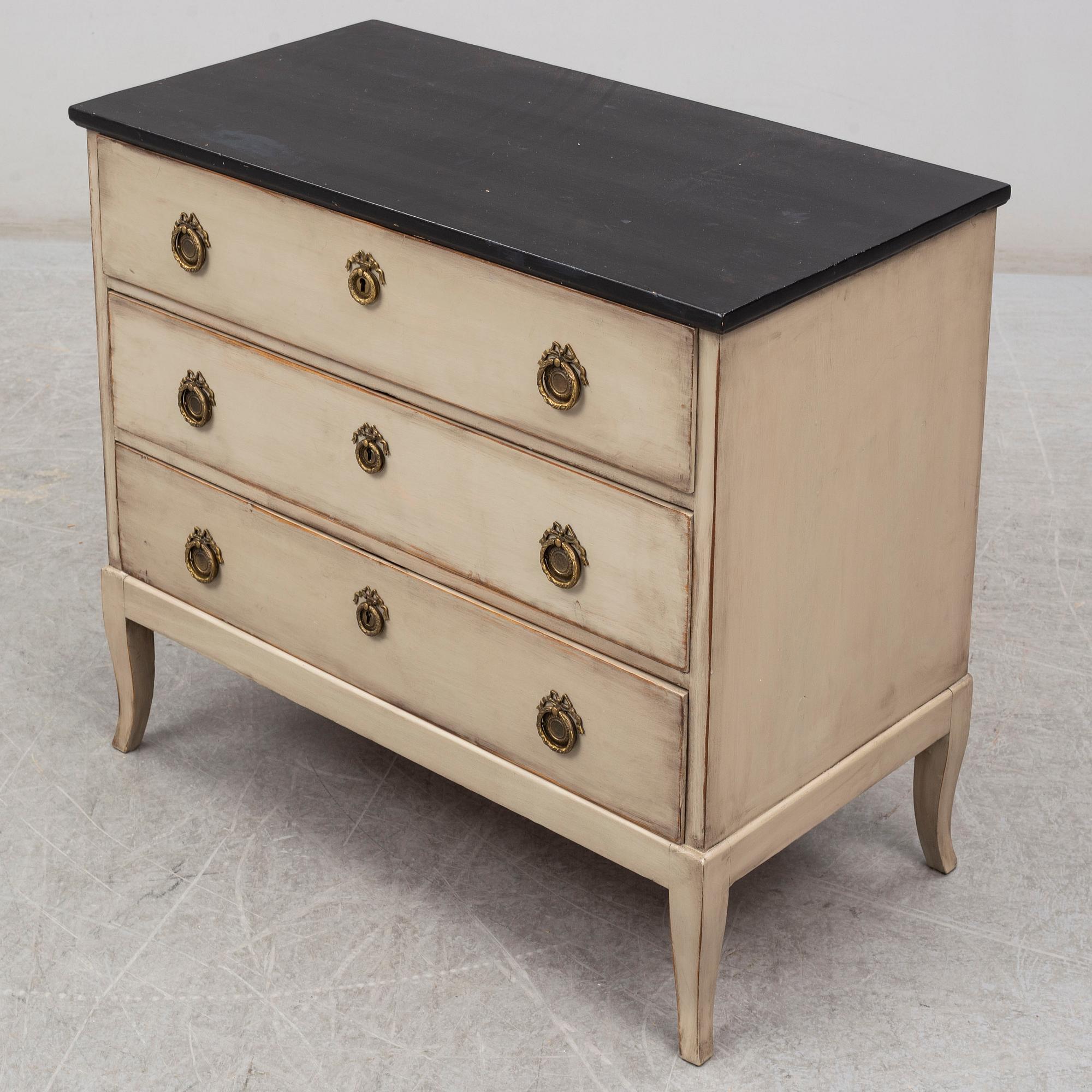 An early 20th century painted chest of drawers.