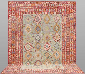 A Kilim carpet, approx. 344 x 268 cm.