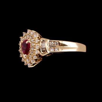 RING, 14 k guld, rubin ca 0.29 ct, diamanter tot ca 0.61 ct.