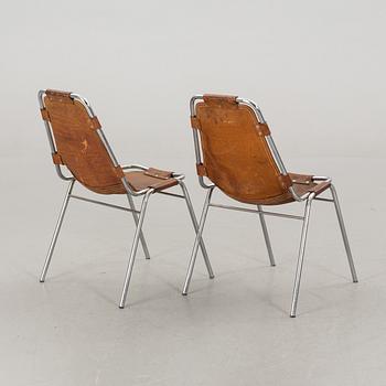 A PAIR OF "LES ARCS" BY CHARLOTTE PERRIAND.