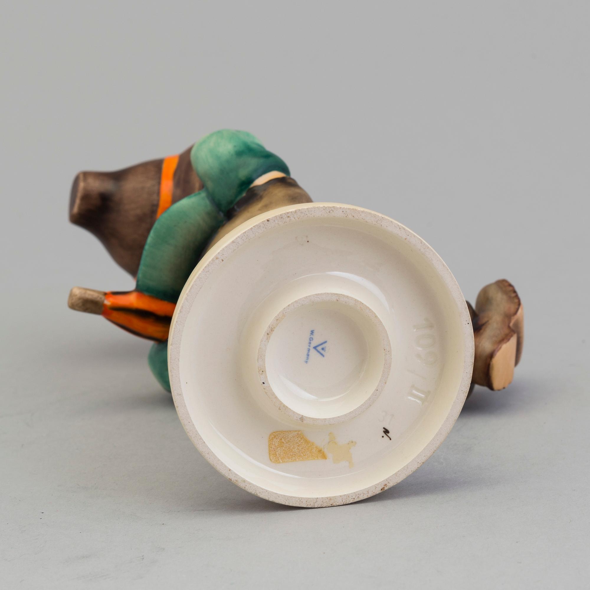 A Hummel porcelain figurine from Goebel, West Germany.