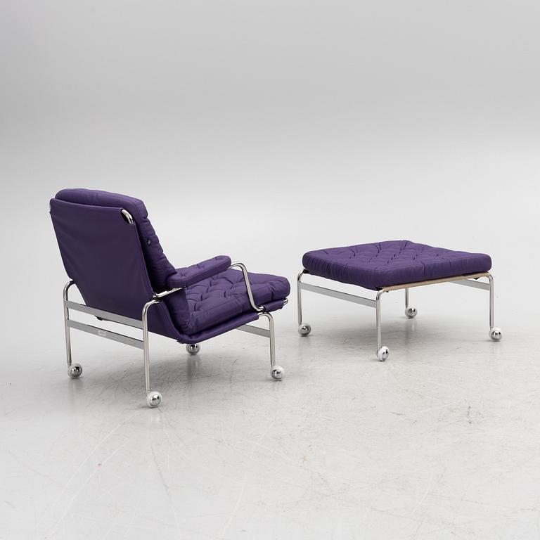 Bruno Mathsson, a limited edition of 'Karin 73' leather upholstered easy chair with footstool, from Dux, Released 2022.