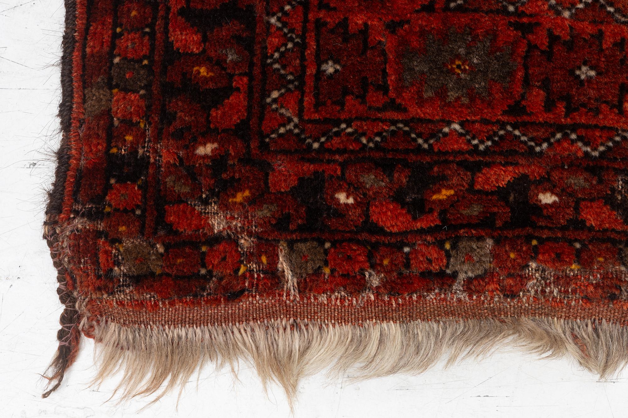 An antique Bechir rug, approx. 215 x 148 cm.