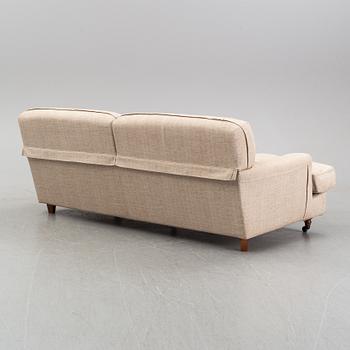 A 'Raffles' sofa designed by Vico Magistretti in 1988 for DePadova.