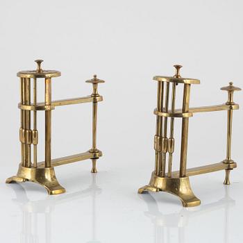 A pair of brass andirons, possibly England, around 1900.