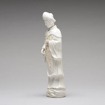 A blanc de chine figure of a lady-in-waiting, Qing dynasty, Kangxi (1662-1722).