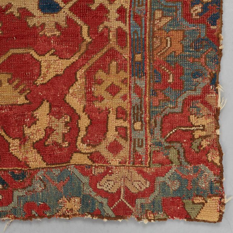 A CARPET FRAGMENT, an antique Western Anatolian "Lotto", 17th century, ca 105 x 125 cm.