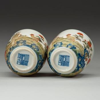 A pair of "chicken" cups, late Qingdynasty. Whit Qianlong seal mark.