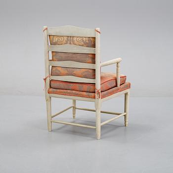 A painted armchair, presumably late 18th century or around the year 1800.