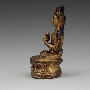 A Tibetan gilt copper alloy figure of Boddhisattva Shadakshari Lokeshvara, 16th Century or older.