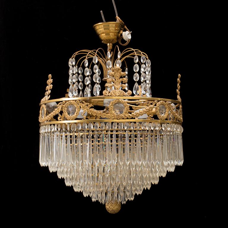 An early 1900s Empire style chandelier.