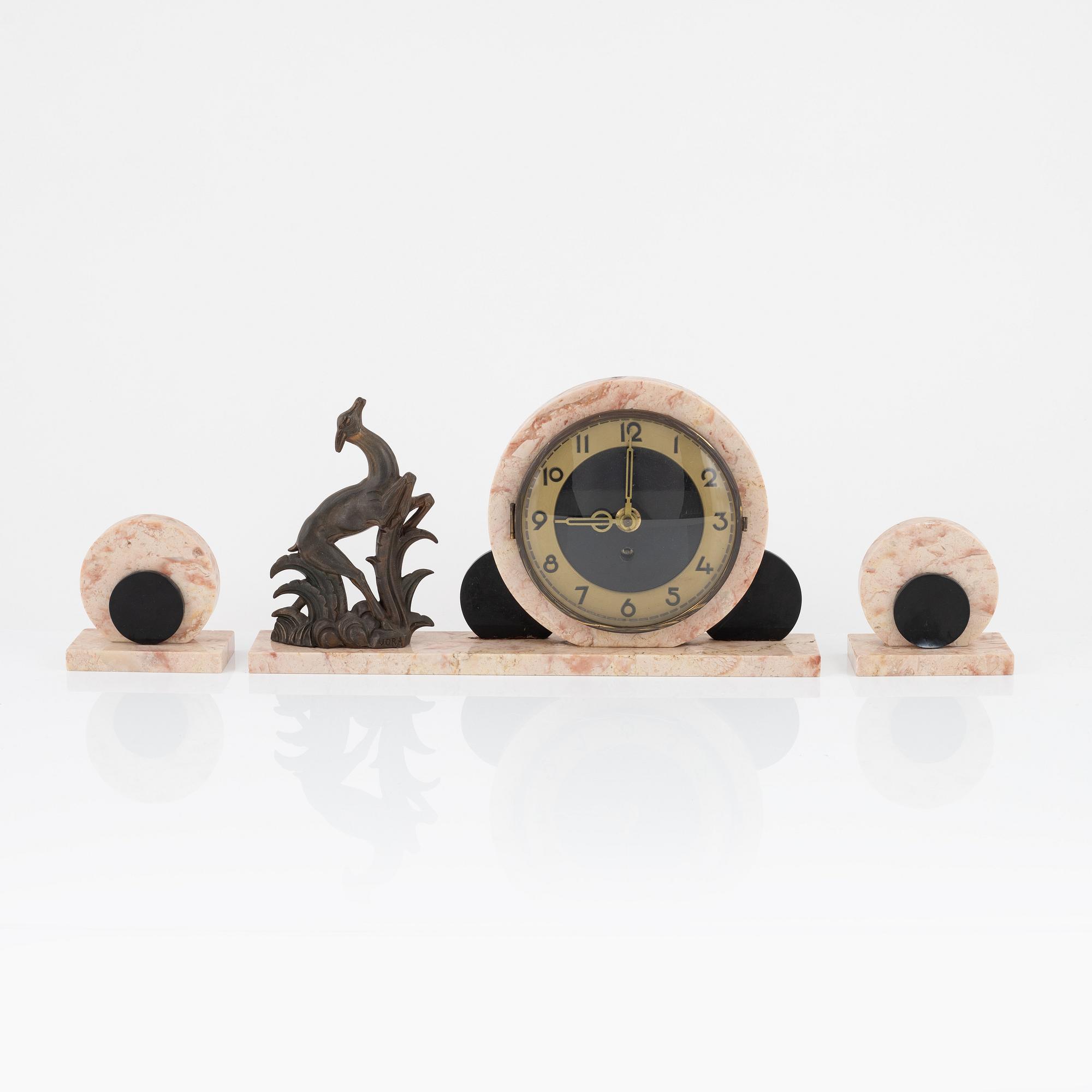 A 3-piece Art Deco mantel clock set, Ucra, France, 1930's.