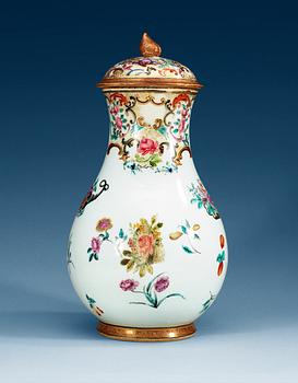 1619. A large famille rose ewer with cover, Qing dynasty, Qianlong (1736-95).