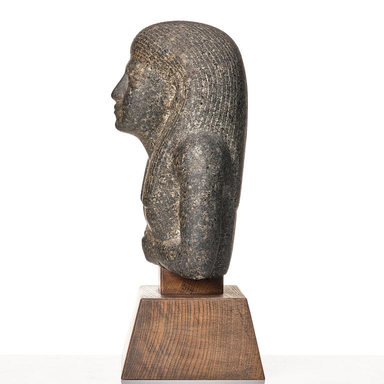 An Egyptian black granite bust of a man, 19th century or older.