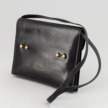 Hermès, a vintage leather bag.